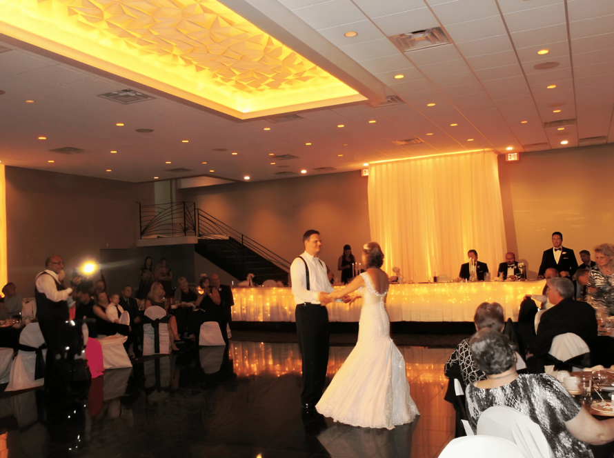 bride and groom dancing in Balconade Room during wedding reception