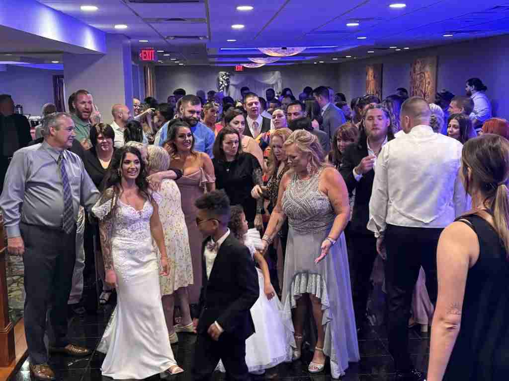 Snap great wedding photo moments with guests on our Terrace Room dance floor.