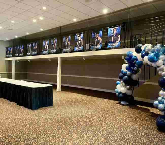 Balloon arch and banners in Balconade Room celebrating Western PA sports