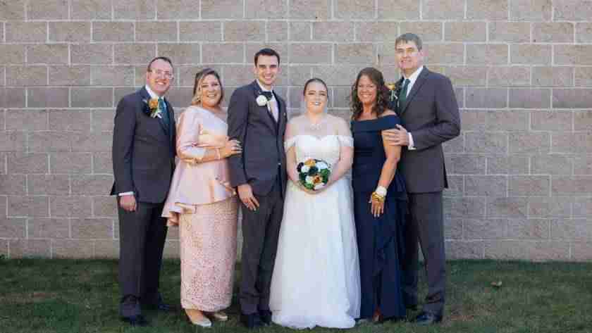 Bride and Groom with their parents on their wedding day