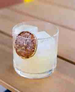 Spicy margarita garnished with a lime wheel