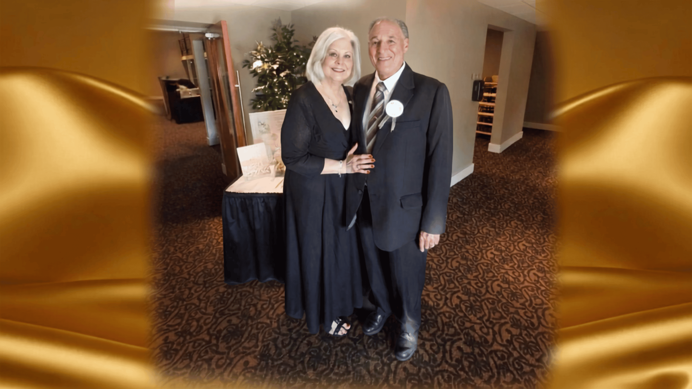 couple poses at their Golden Anniversary party celebrating 50 years of marriage