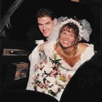 Bride and Groom exiting their limousine on their wedding day October 1995